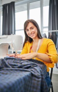 Woman sewing with an Overlocker